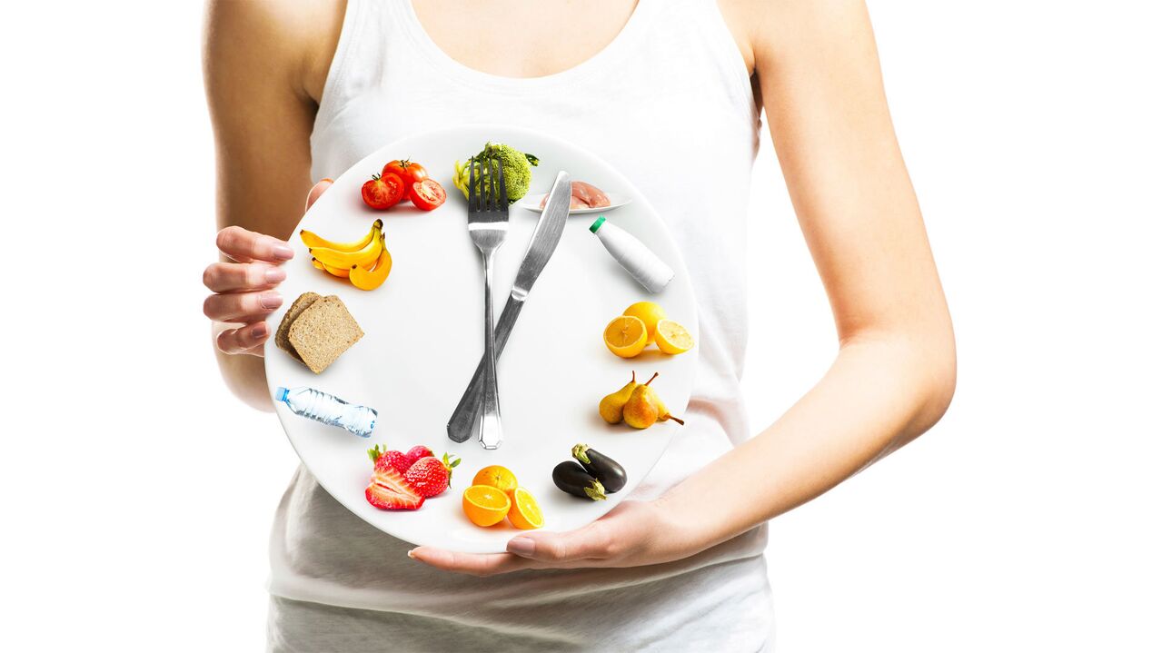 The girl held a plate of food